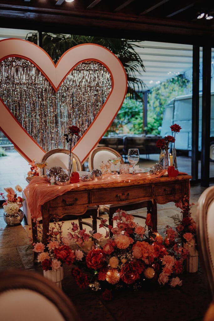 The newlyweds wedding dinner sweetheart table 